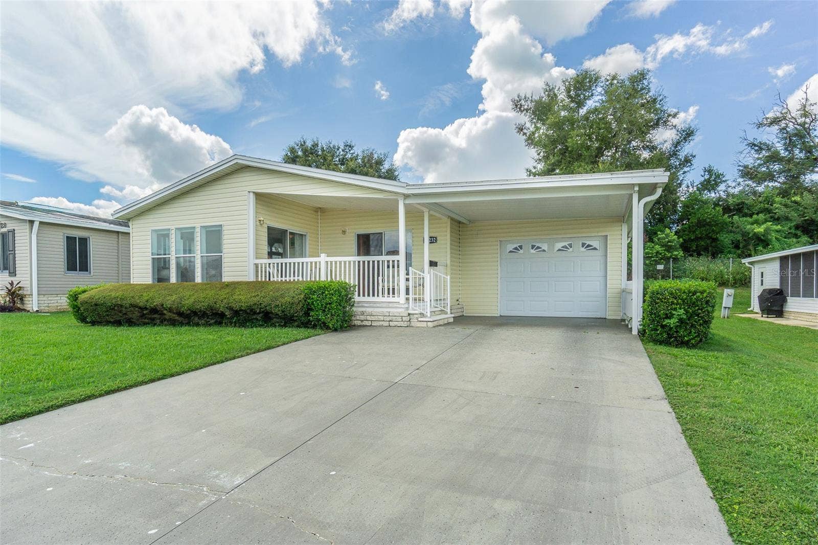 37232 NEUKOM AVENUE, Zephyrhills, FL 33541 Large driveway and GARAGE!