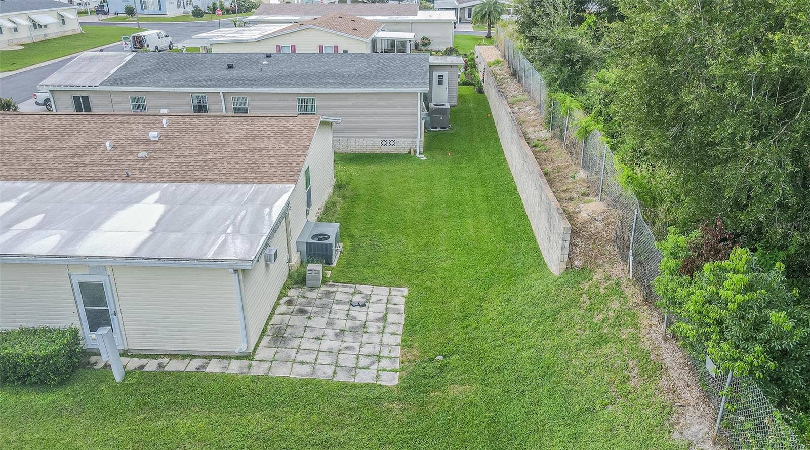 37232 NEUKOM AVENUE, Zephyrhills, FL 33541 Back open patio to BBQ with no rear neighbors!