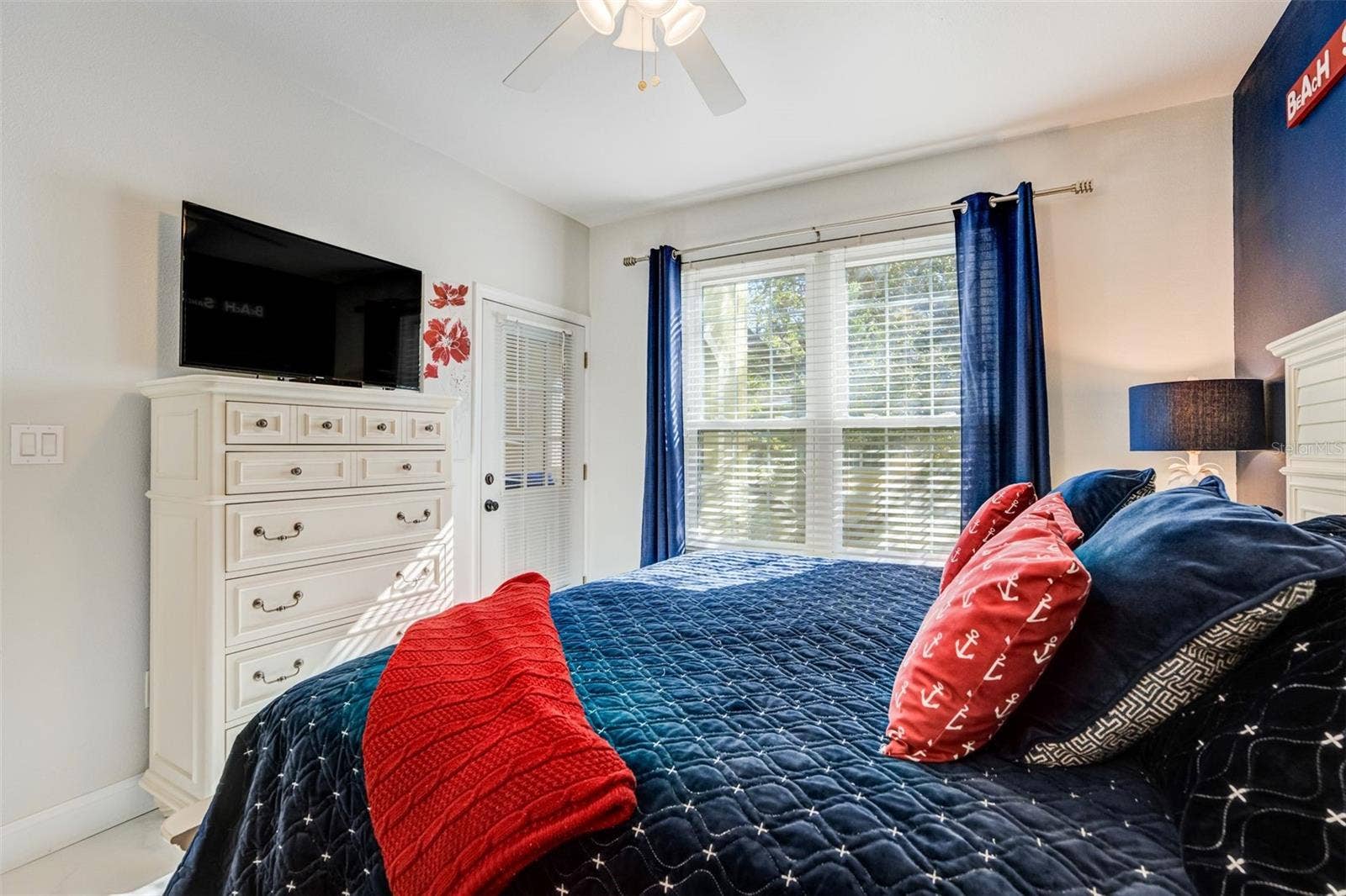 1230 S MISSOURI AVENUE, #704, Clearwater, FL 33756 Primary bedroom with french door to patio