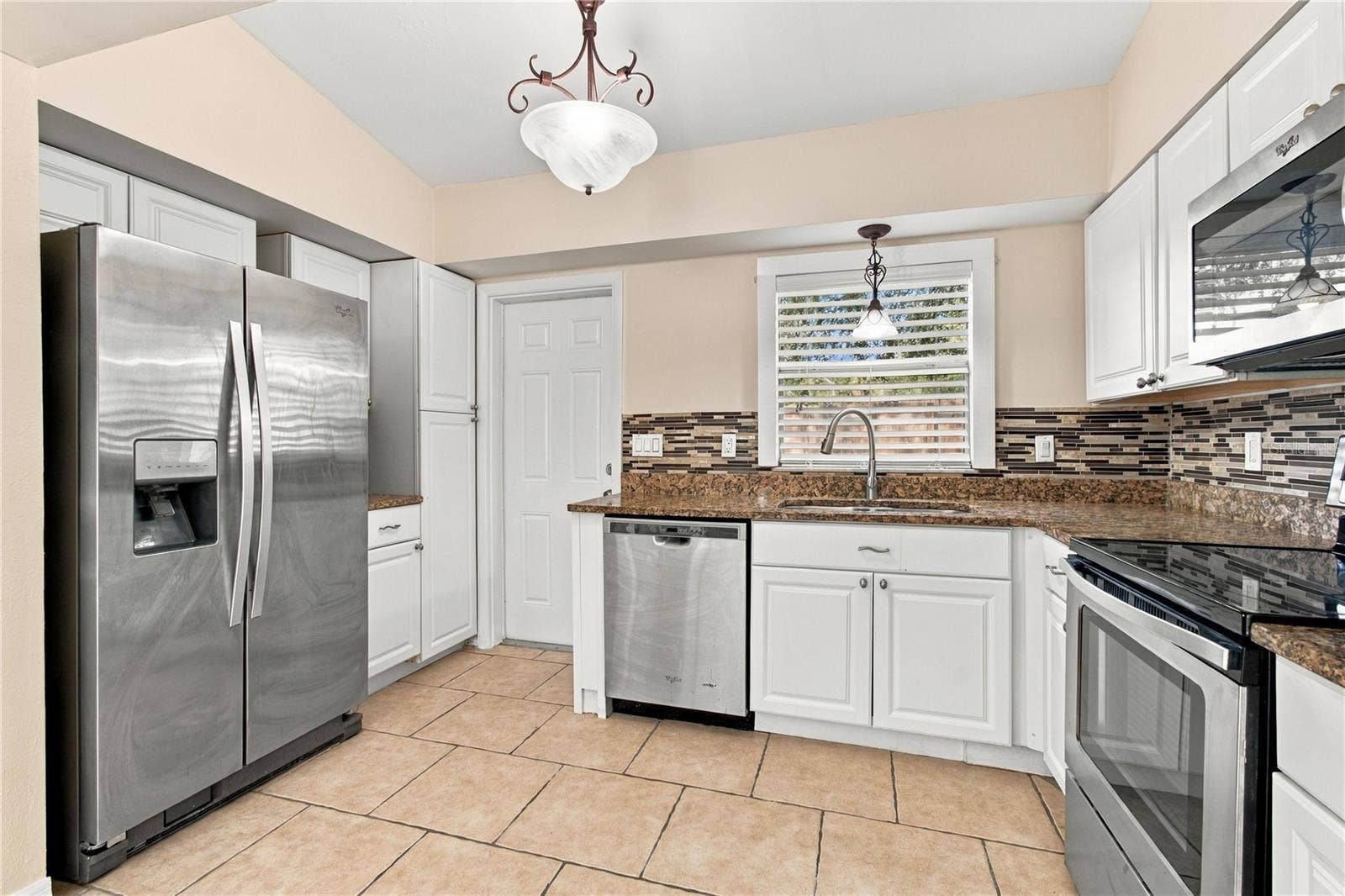 10312 LAKE CARROLL WAY, Tampa, FL 33618 Kitchen- Stainles steel appliances