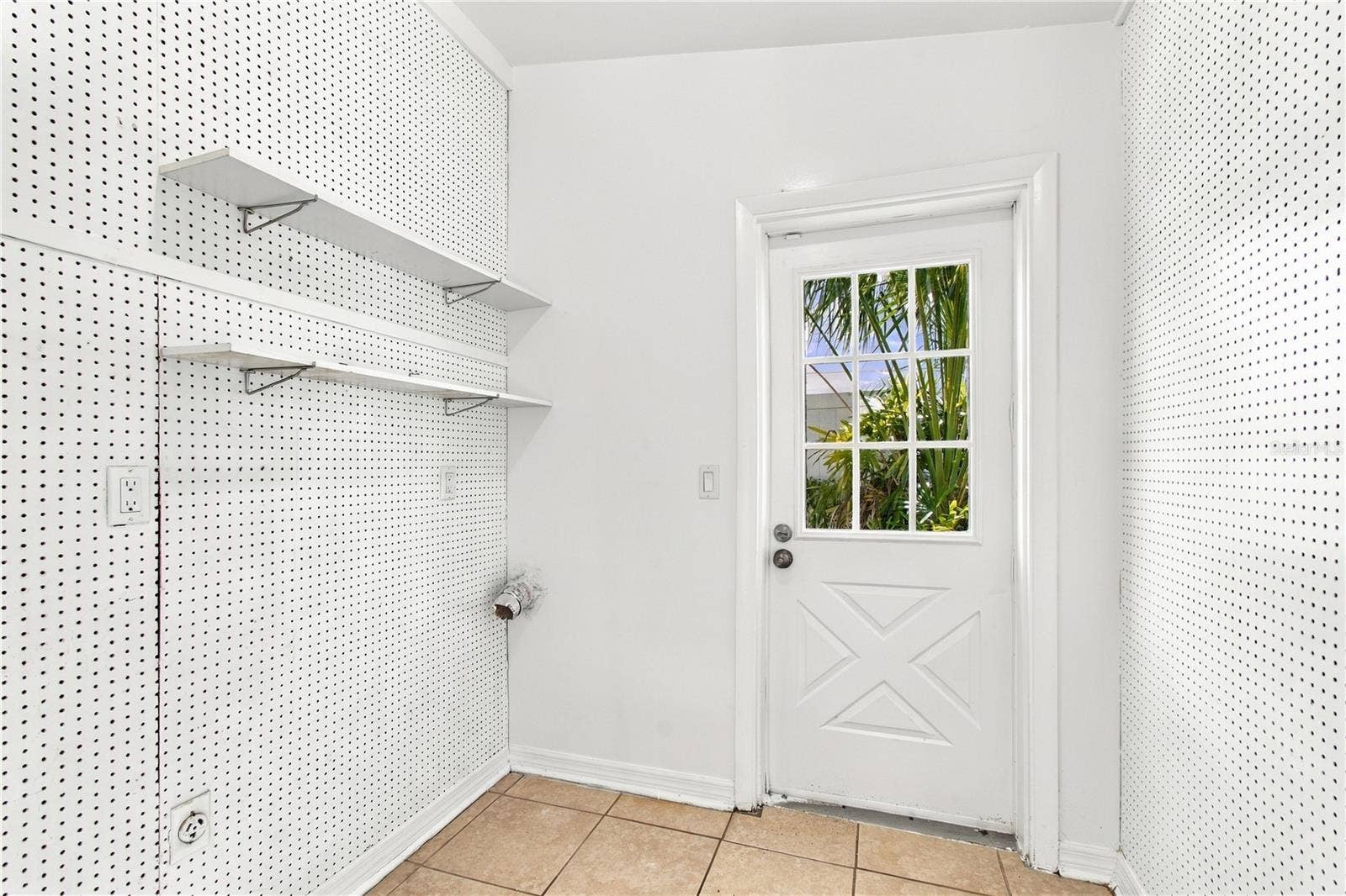 10312 LAKE CARROLL WAY, Tampa, FL 33618 Laundry room off the primary bedroom