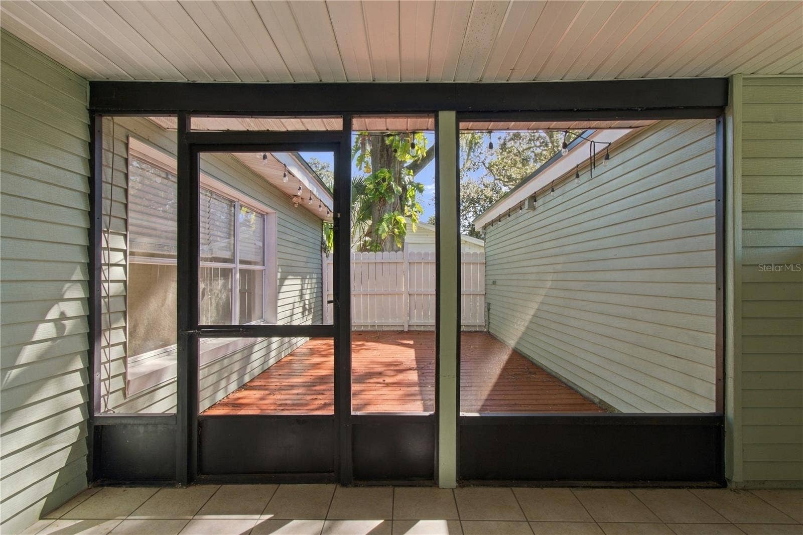 10312 LAKE CARROLL WAY, Tampa, FL 33618 enclosed Patio overlooking exterior Deck