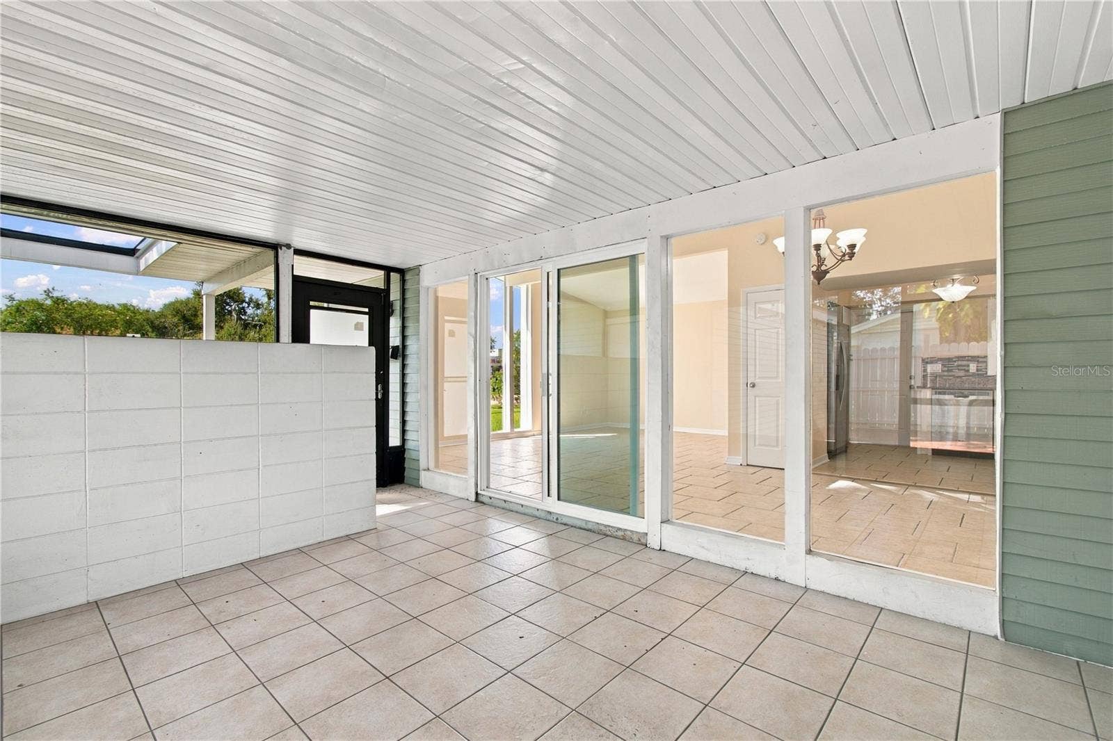 10312 LAKE CARROLL WAY, Tampa, FL 33618 enclosed Patio