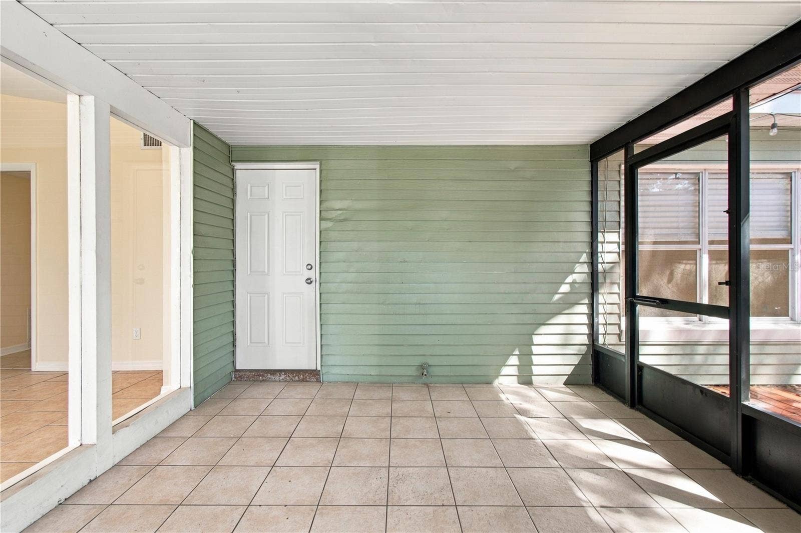 10312 LAKE CARROLL WAY, Tampa, FL 33618 Patio facing door to hallway