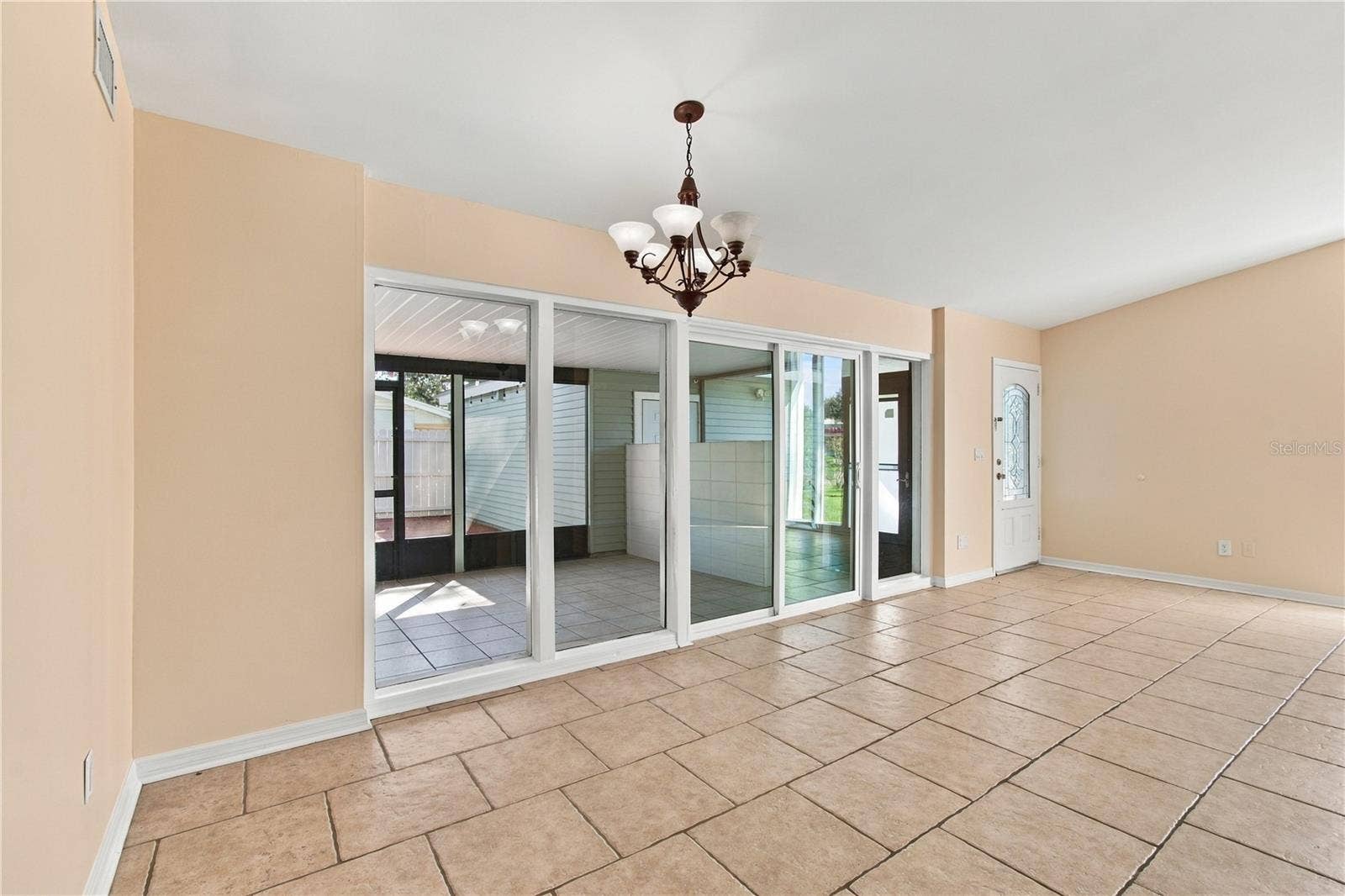 10312 LAKE CARROLL WAY, Tampa, FL 33618 dining-overlooking the Patio and Deck