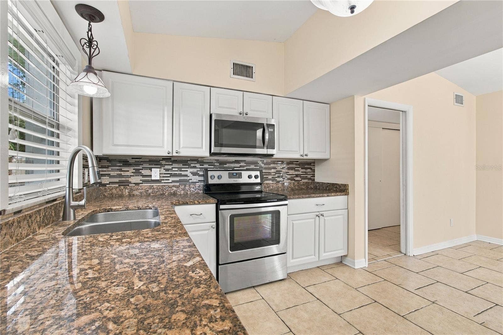 10312 LAKE CARROLL WAY, Tampa, FL 33618 Kitchen with Granite countertops