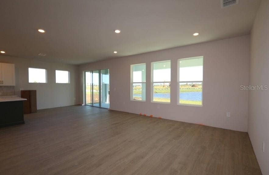 12828 SALTY DOG CROSSING, Palmetto, FL 34221 Family Room **Under Construction