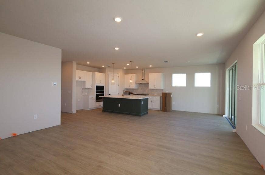 12828 SALTY DOG CROSSING, Palmetto, FL 34221 Family Room **Under Construction