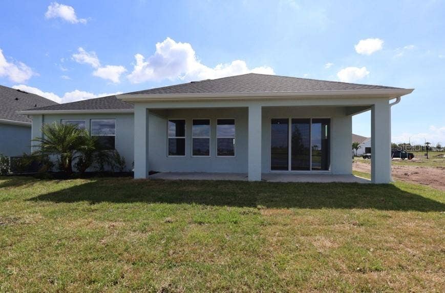 12828 SALTY DOG CROSSING, Palmetto, FL 34221 Rear Exterior **Under Construction
