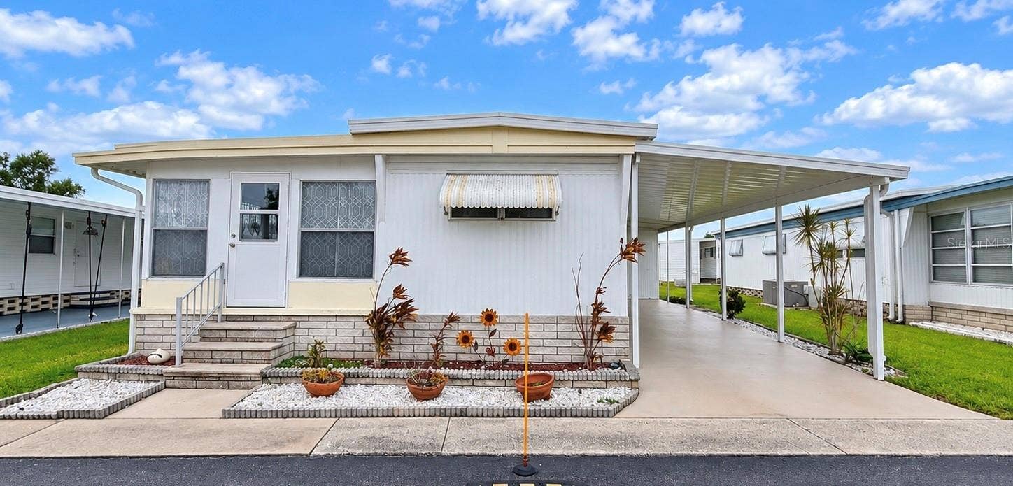 41 PINDO PALM STREET E, #41, Largo, FL 33770 Front of home faces East