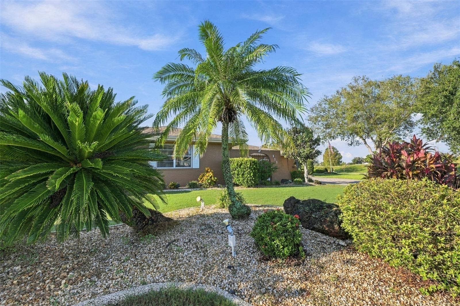 211 STONEHAM DRIVE, Sun City Center, FL 33573 Easy maintenance and lots of green space for privacy and enjoyment.
