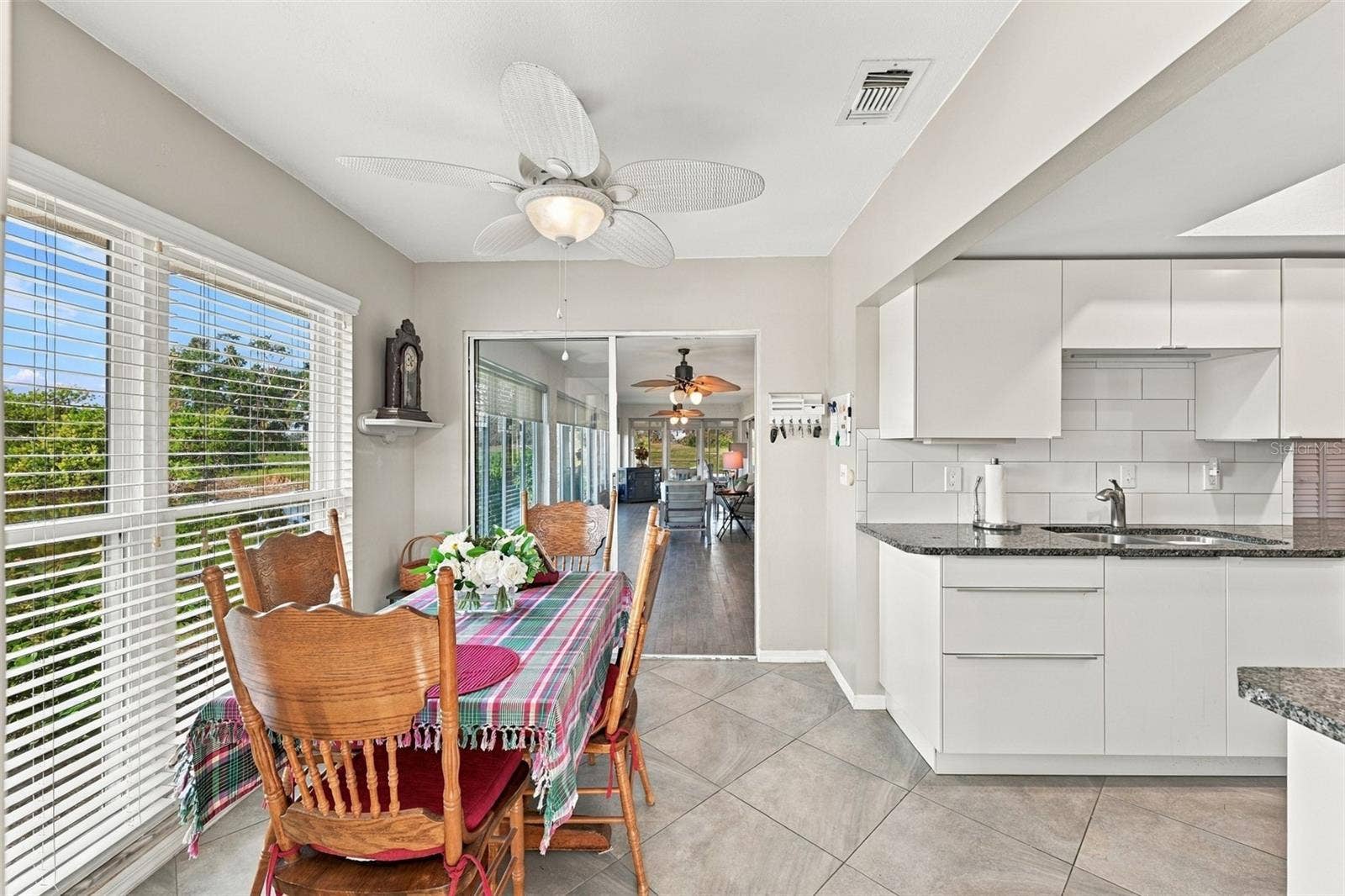 211 STONEHAM DRIVE, Sun City Center, FL 33573 Beautiful and cozy eat-in kitchen is perfect for morning coffee and watching the wild life.