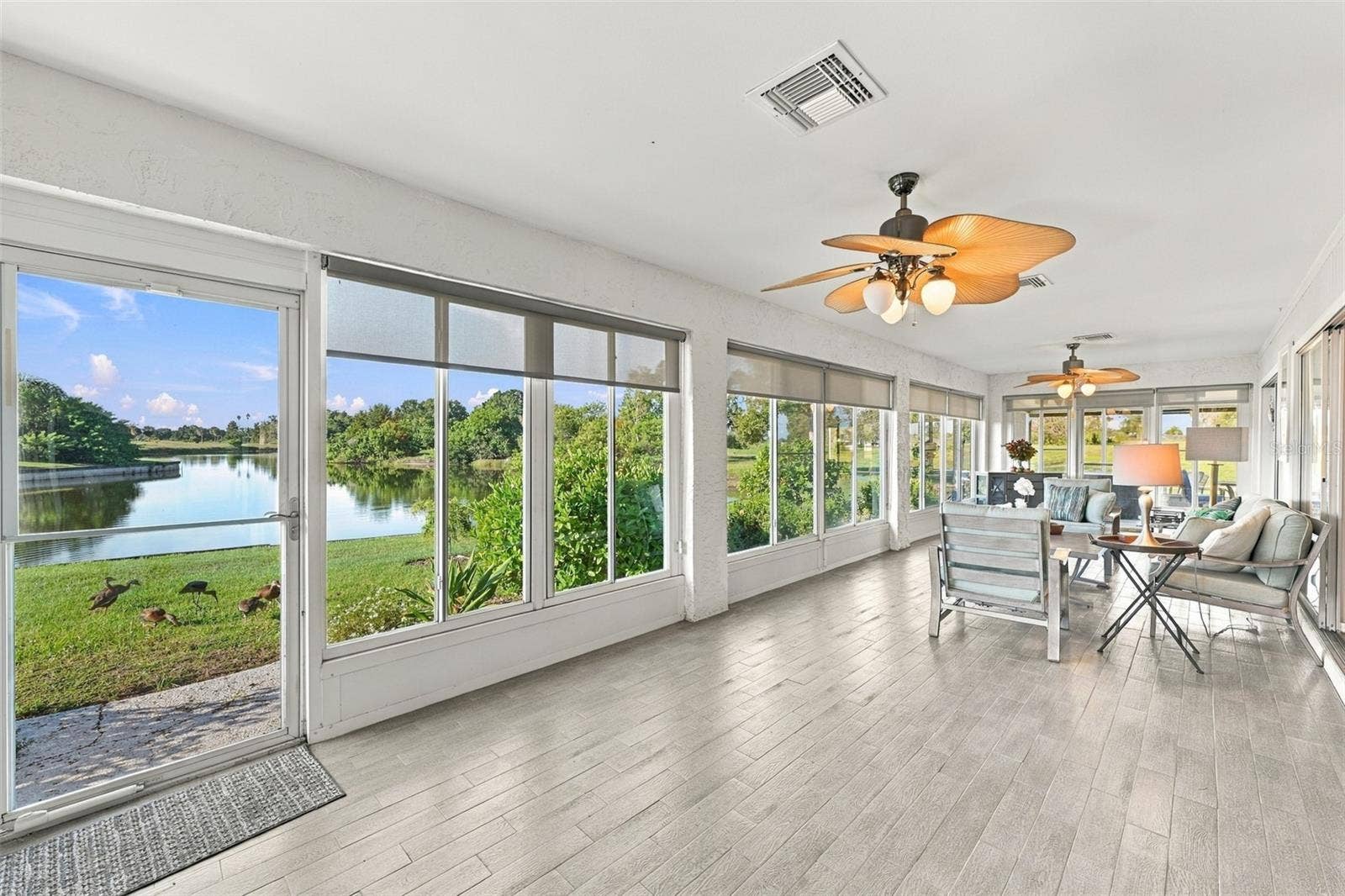 211 STONEHAM DRIVE, Sun City Center, FL 33573 The Florida room is exceptional in size, light and comfort. Ducks, herons, fish, turtles and various other wild life are right out your back door.