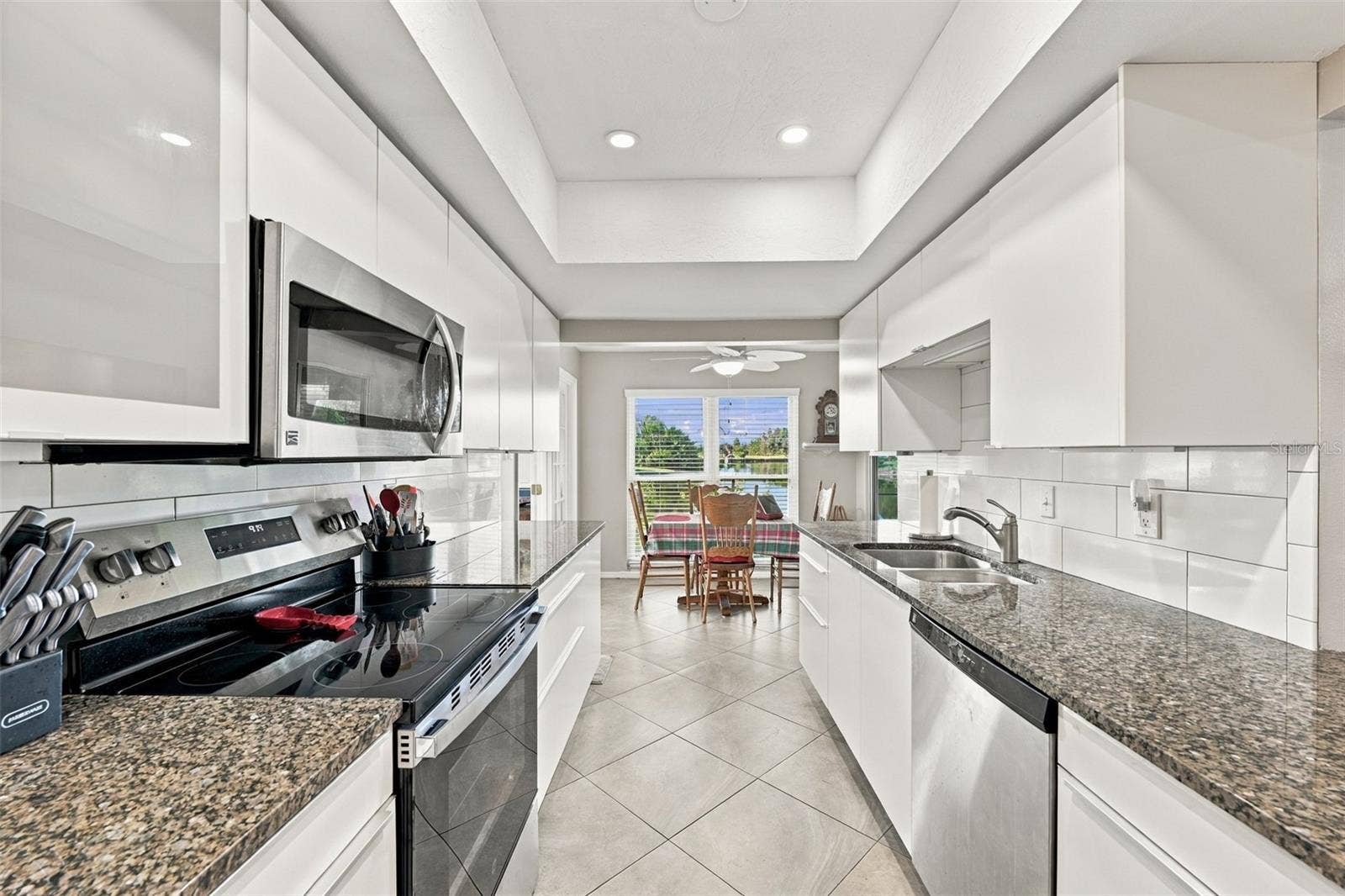 211 STONEHAM DRIVE, Sun City Center, FL 33573 Modern, bright and exceptionally clean and functional kitchen.