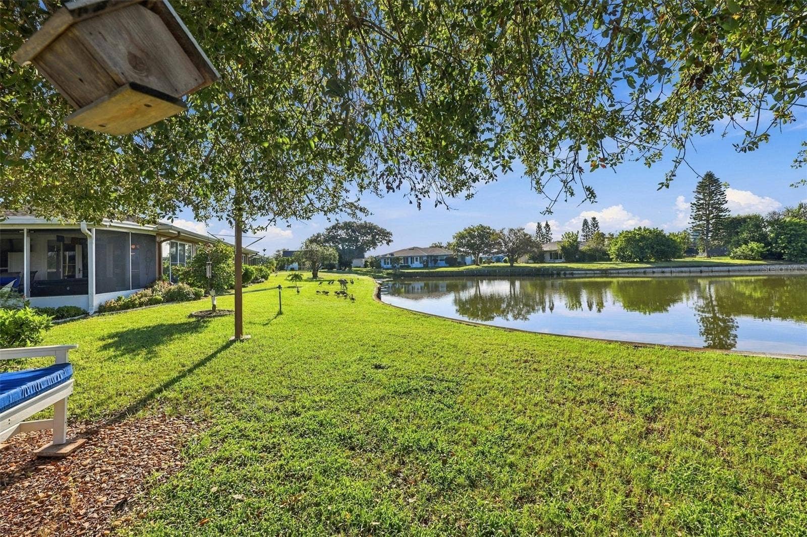 211 STONEHAM DRIVE, Sun City Center, FL 33573 Side view of the backyard.