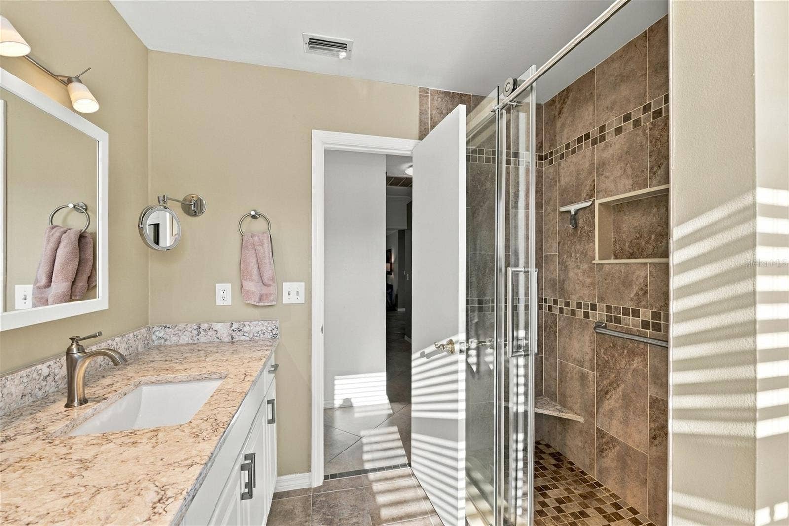 211 STONEHAM DRIVE, Sun City Center, FL 33573 Guest bathroom has shower but no tub.