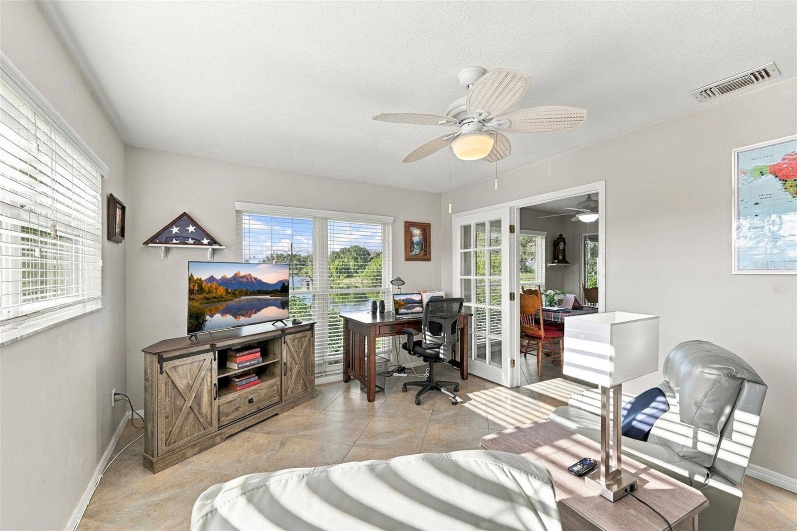 211 STONEHAM DRIVE, Sun City Center, FL 33573 Large and spacious with a glass pane door for an updated look and what a view!!