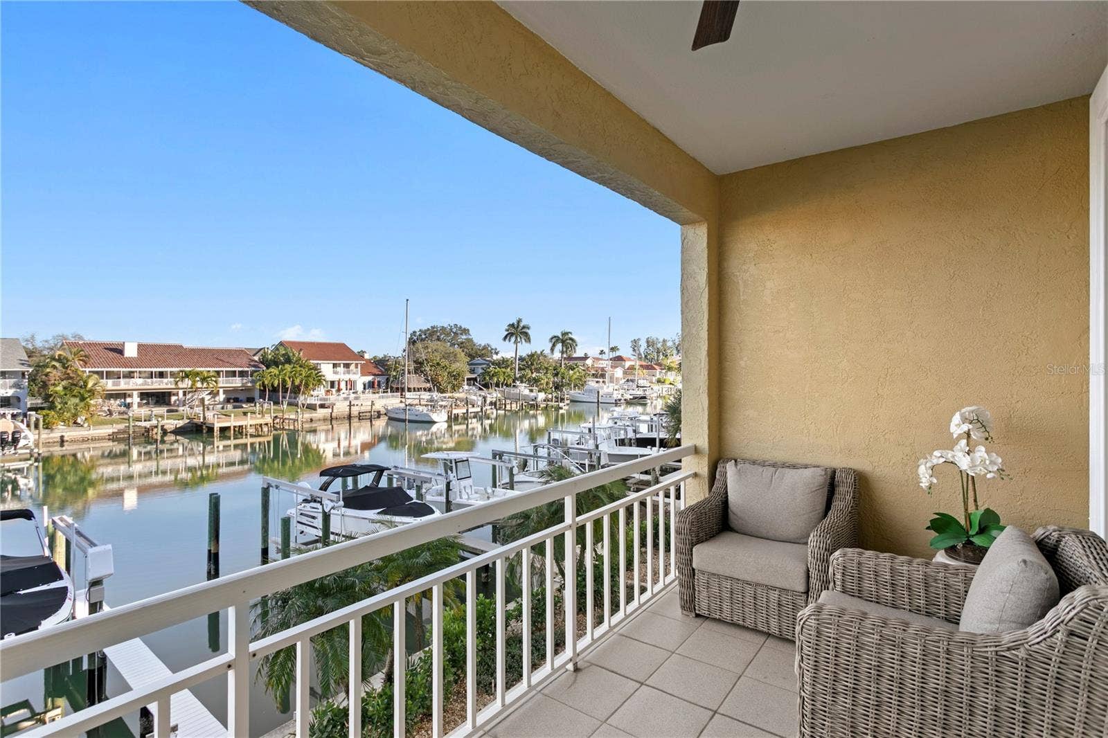 1067 PINELLAS BAYWAY S, St Petersburg, FL 33715 living room balcony