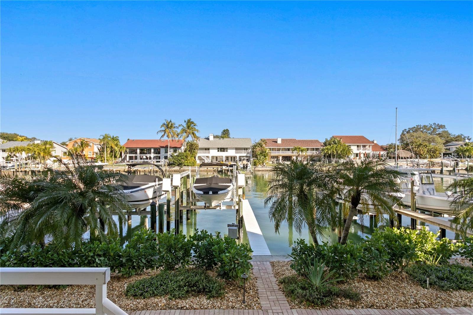 1067 PINELLAS BAYWAY S, St Petersburg, FL 33715 walkway to dock