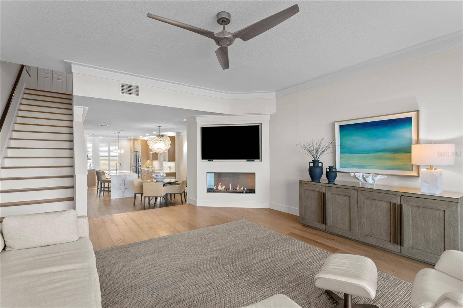 1067 PINELLAS BAYWAY S, St Petersburg, FL 33715 Living room with fireplace