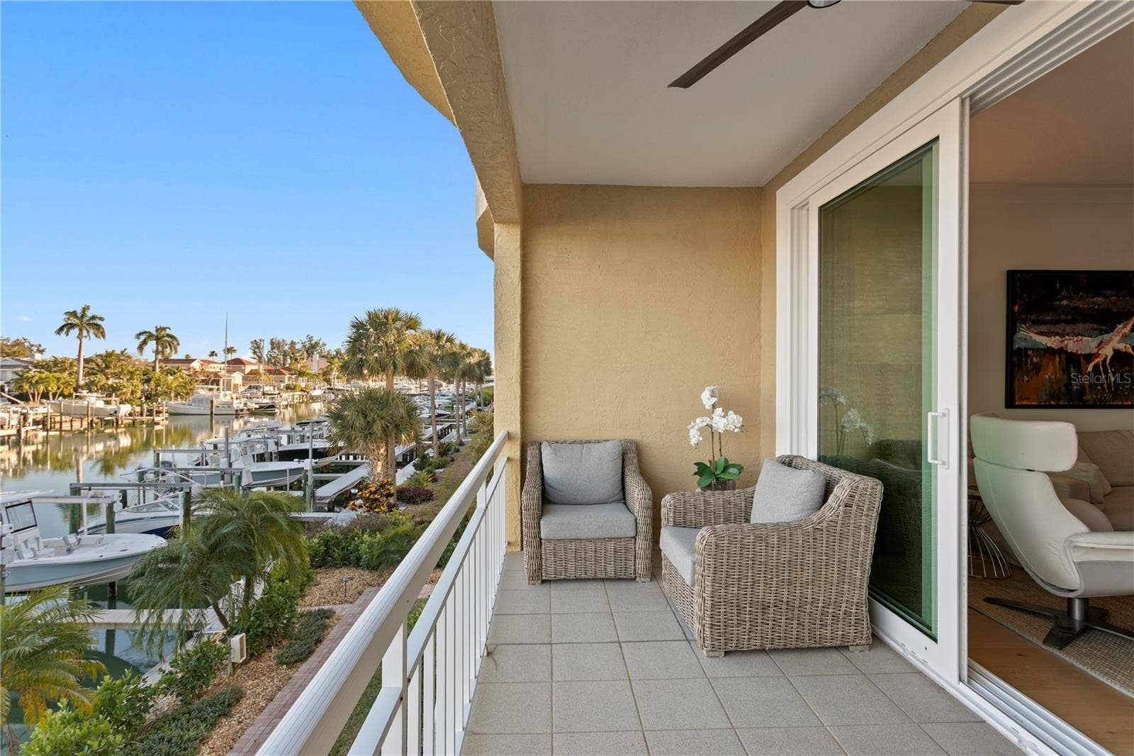 1067 PINELLAS BAYWAY S, St Petersburg, FL 33715 living room balcony