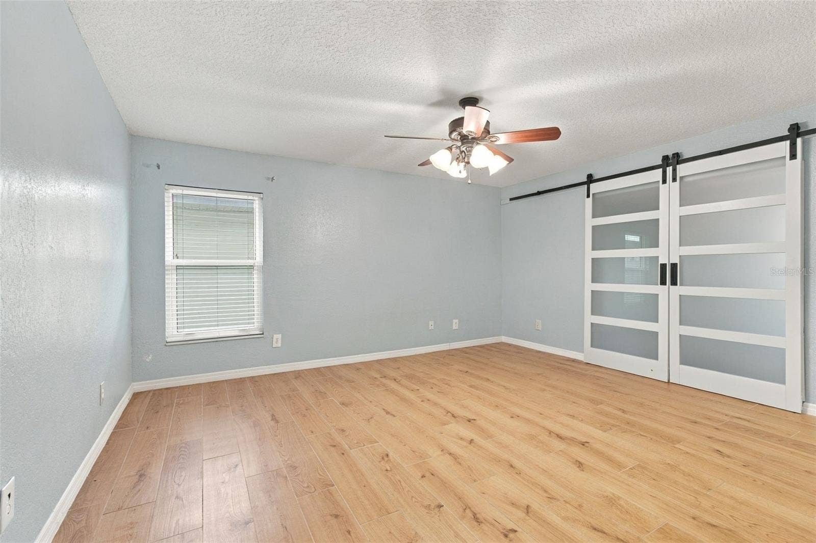 2254 HERON CIR, Clearwater, FL 33762 Second bedroom with full wall closet.