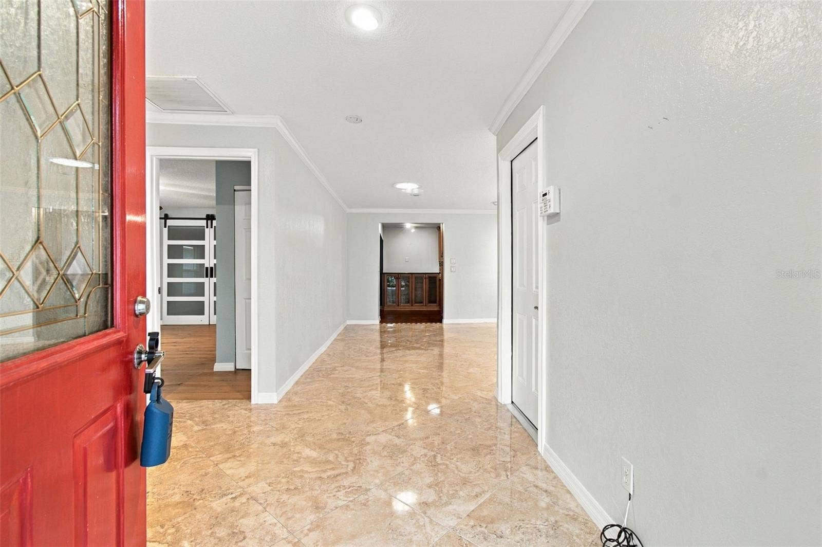 2254 HERON CIR, Clearwater, FL 33762 A spacious foyer leads into this stunning home.
