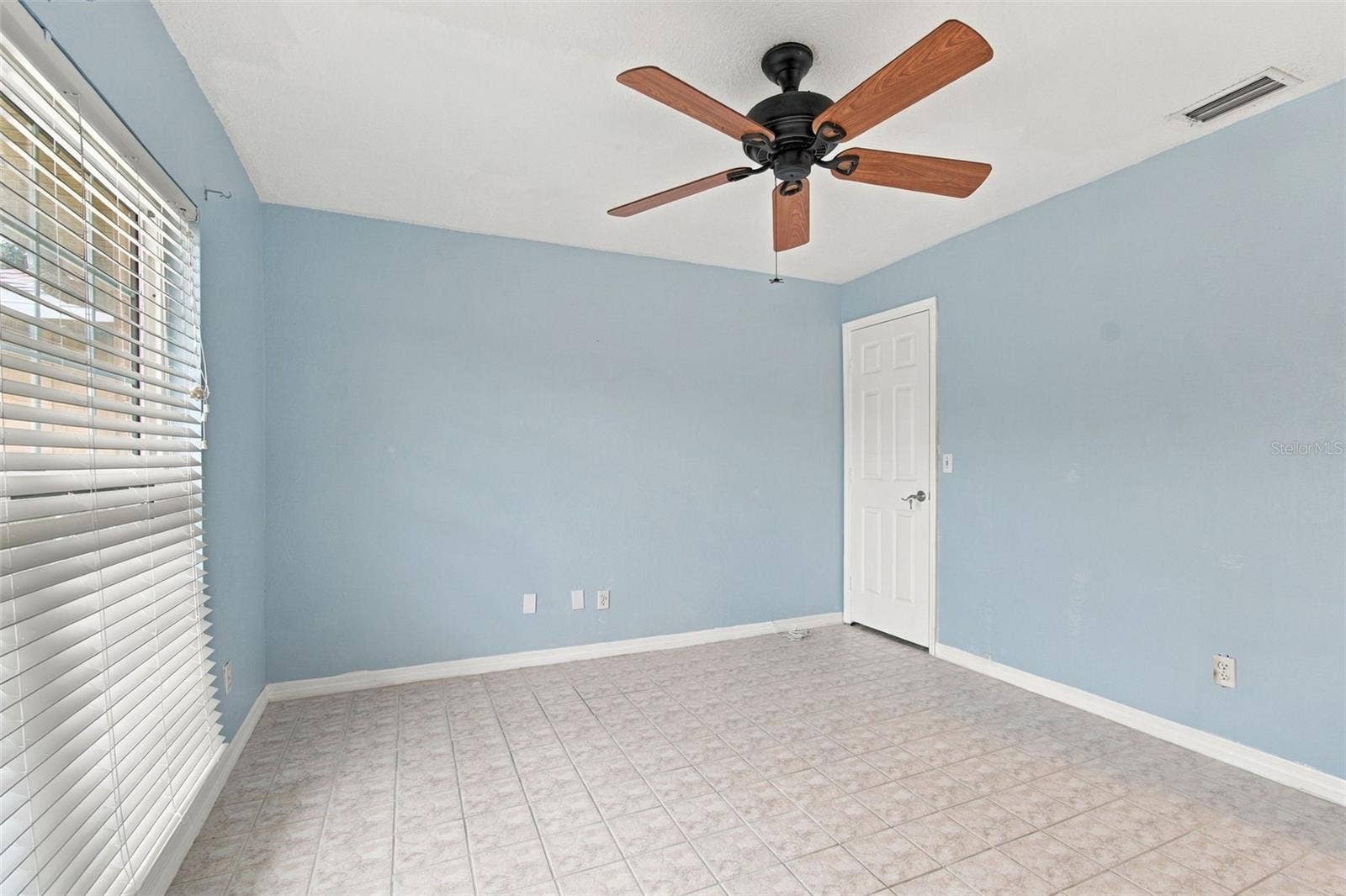 2254 HERON CIR, Clearwater, FL 33762 This is the front bedroom with a large walk-in closet.
