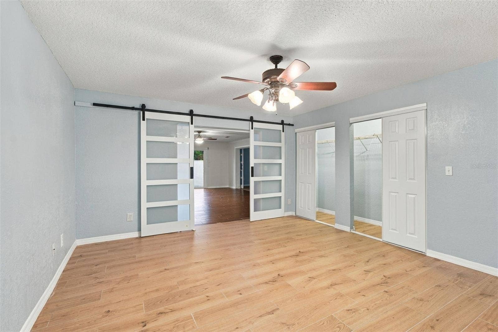 2254 HERON CIR, Clearwater, FL 33762 Second bedroom has access to the living room.