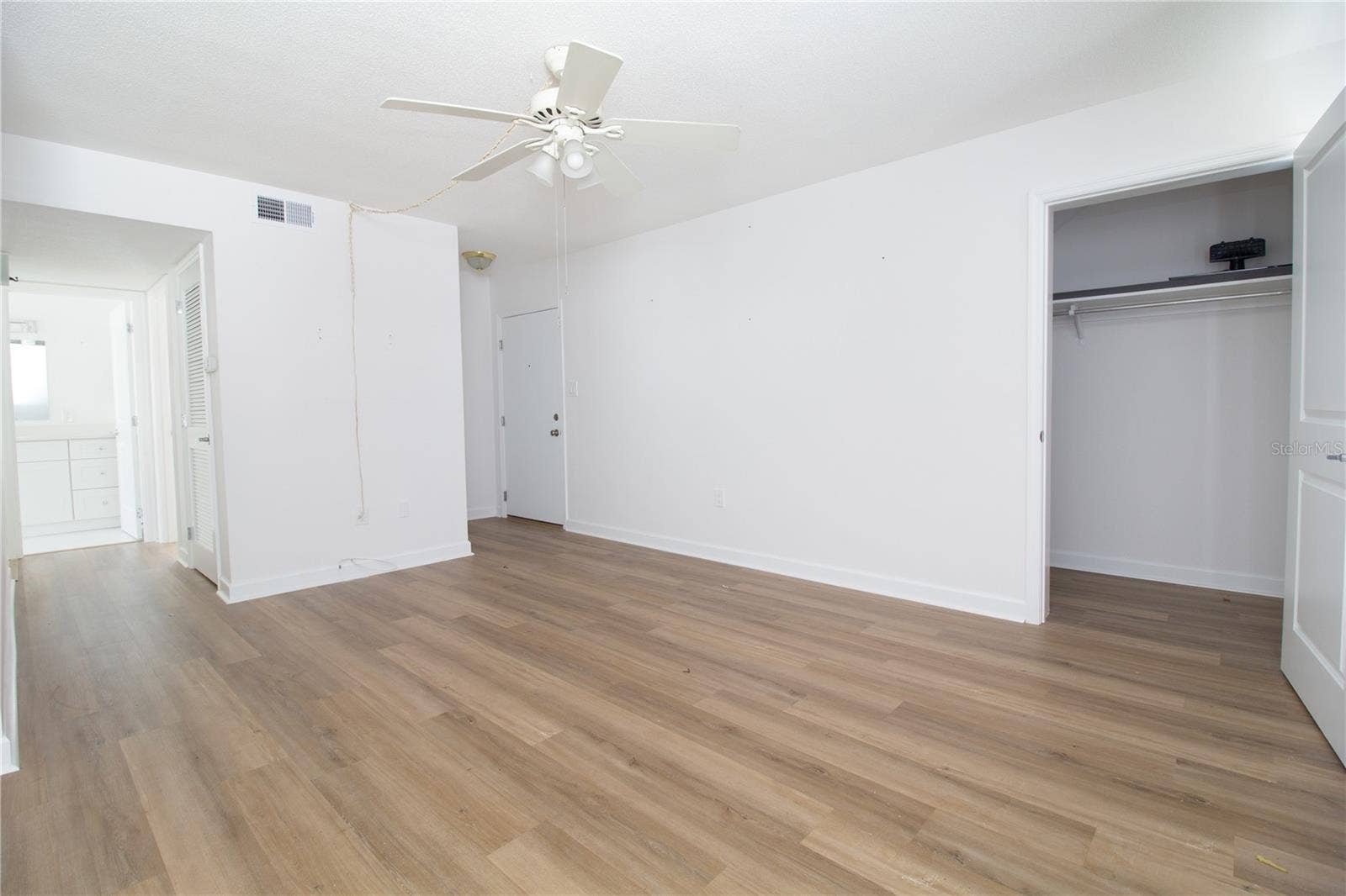 Living room dinning showing extra closet understair