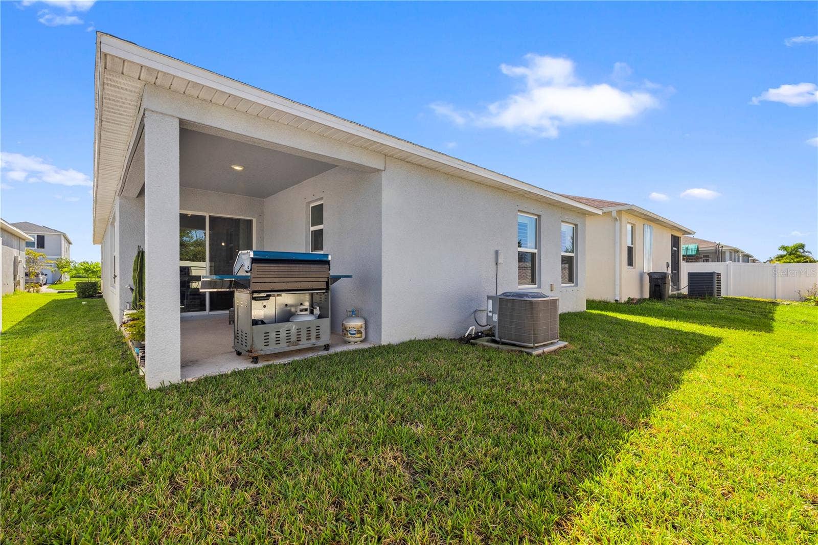 2604 89TH STREET CIRCLE E, Palmetto, FL 34221 Back Yard (Partially Fenced)
