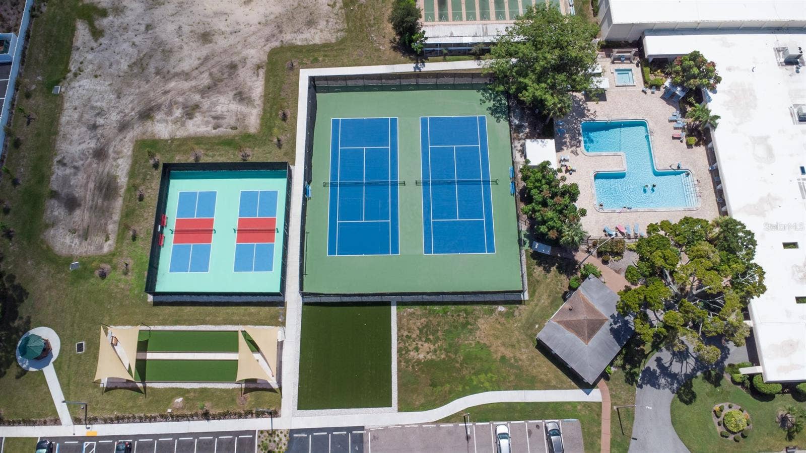 5501 80TH STREET N, #303, St Petersburg, FL 33709 Aerial of Clubhouse Pool & Spa