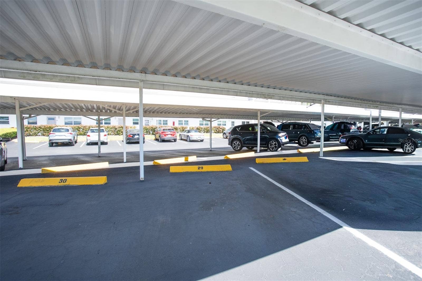 5501 80TH STREET N, #303, St Petersburg, FL 33709 Carport #29 (belongs with this unit)