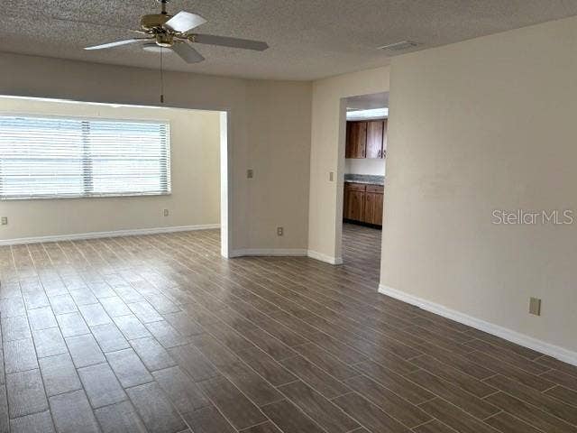2102 HARRINGAY STREET, #449, Sun City Center, FL 33573 A welcoming living area, updated ceramic tile flooring throughout. Beautiful natural light from the enclosed lanai.