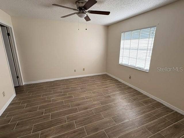 2102 HARRINGAY STREET, #449, Sun City Center, FL 33573 Primary bedroom with updated ceramic tile flooring.