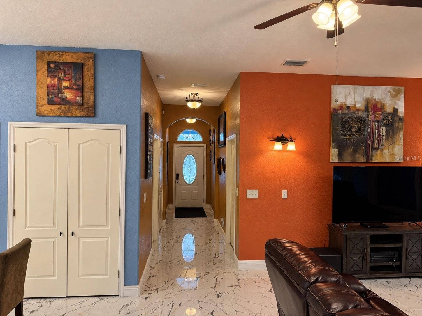 3009 W CLINTON STREET, Tampa, FL 33614 Living room to the right, kitchen to the left - Open floor plan