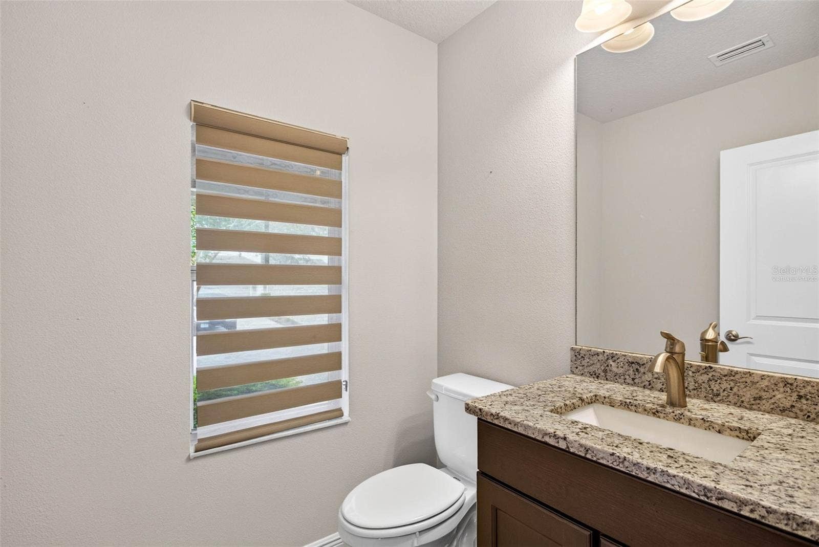 14619 ROCKY BROOK DRIVE, Tampa, FL 33625 virtually staged - half bath