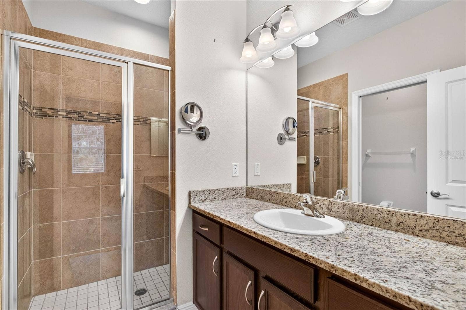 14619 ROCKY BROOK DRIVE, Tampa, FL 33625 virtually staged - upstairs suite bathroom