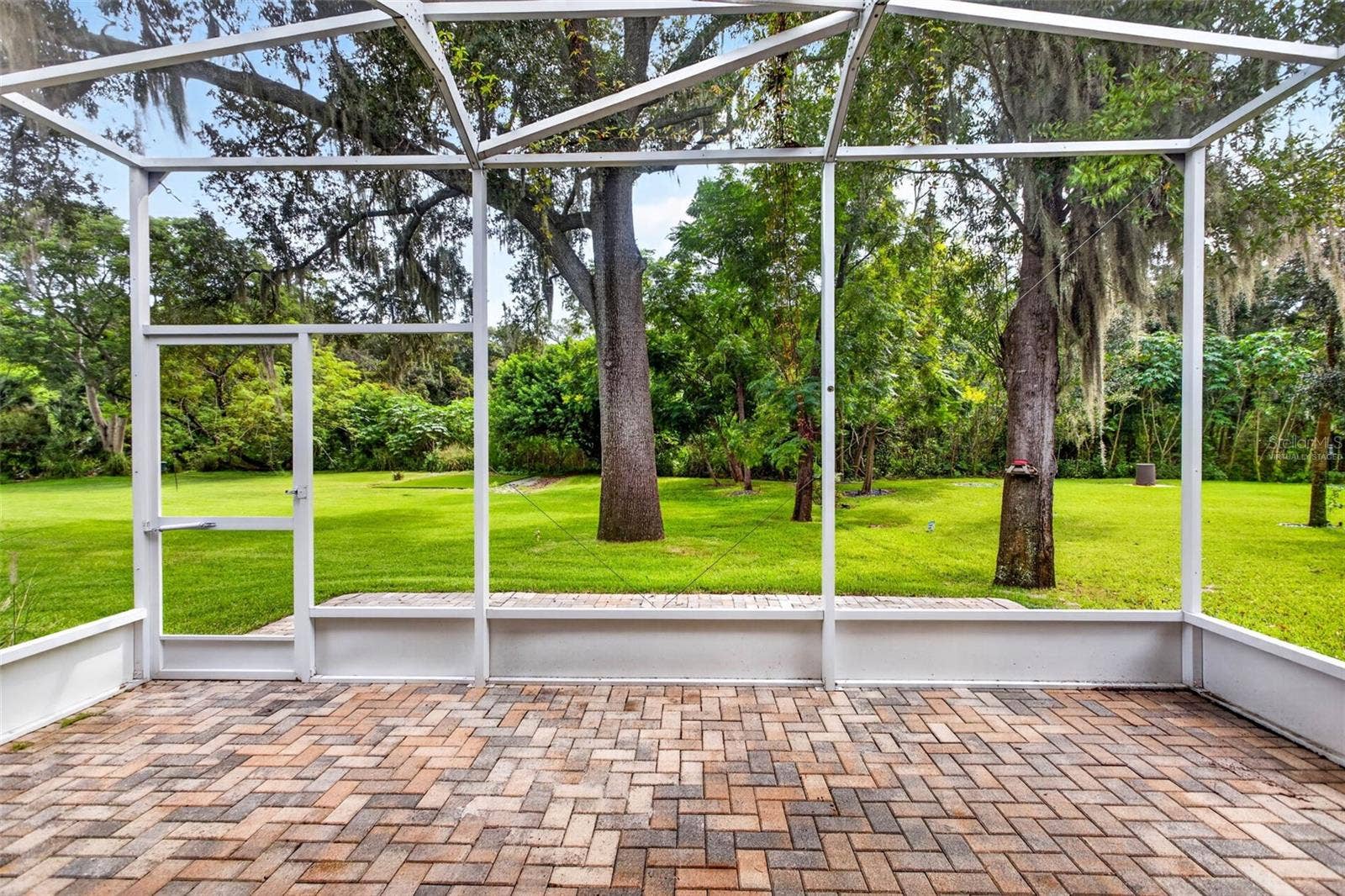 14619 ROCKY BROOK DRIVE, Tampa, FL 33625 virtually staged - outdoor back patio