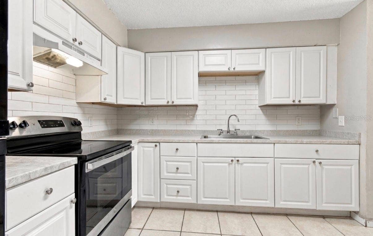 1504 E POINSETTIA AVENUE, Tampa, FL 33612