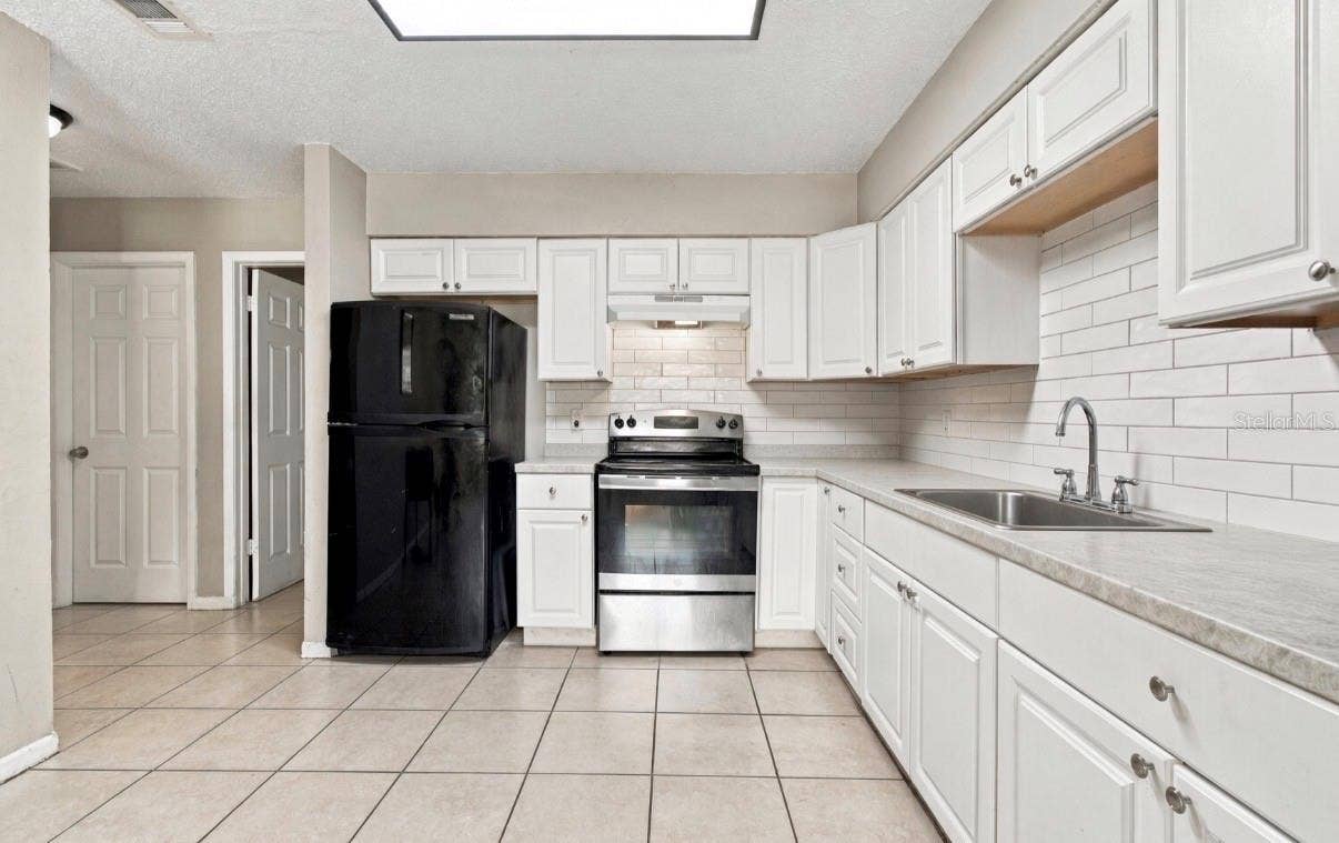 1504 E POINSETTIA AVENUE, Tampa, FL 33612