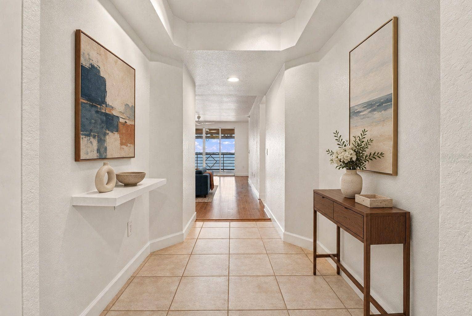 4993 BACOPA LANE S, #304, St Petersburg, FL 33715 Front hallway entry virtually staged