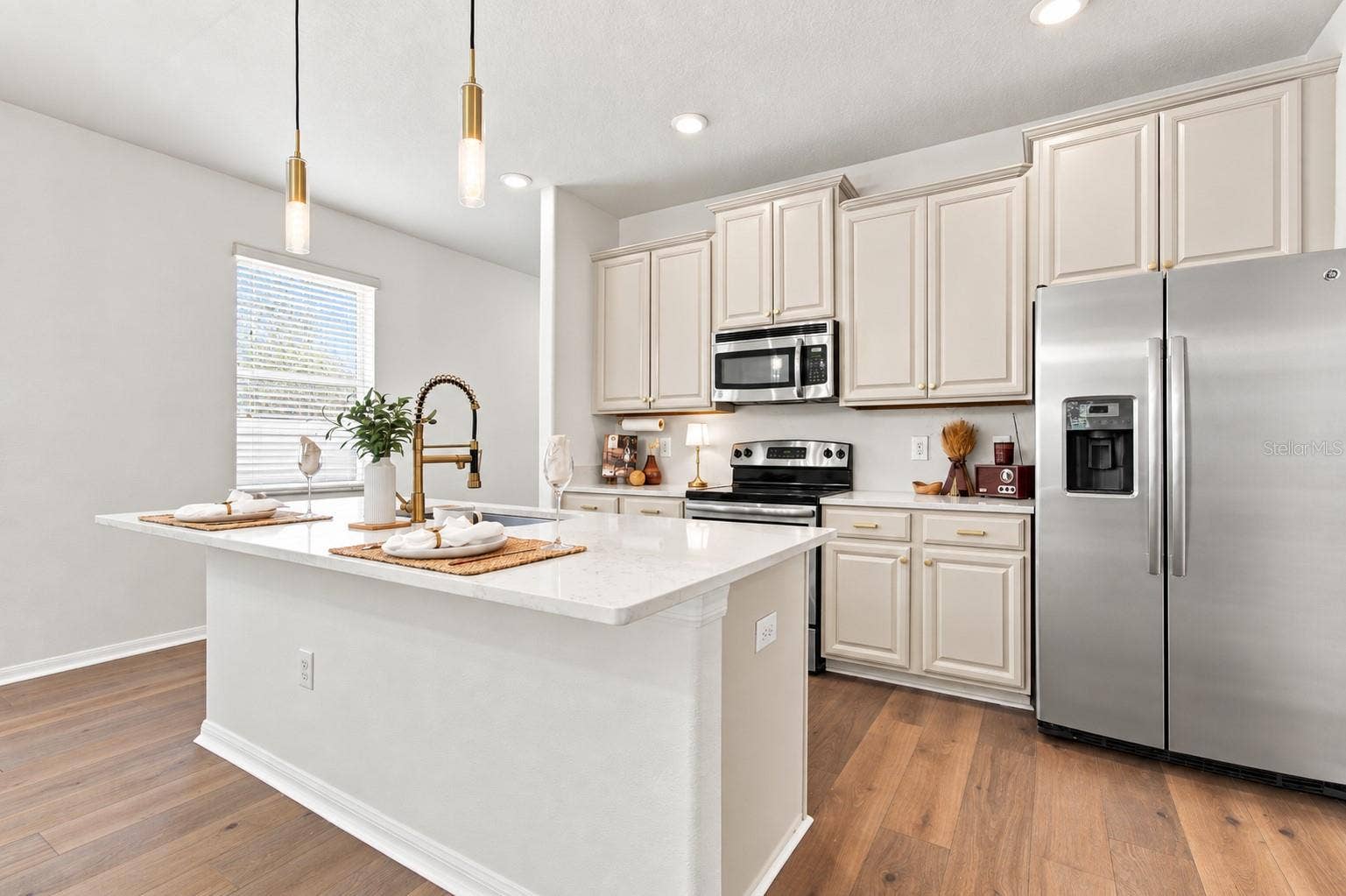 Updated kitchen with quartz island.