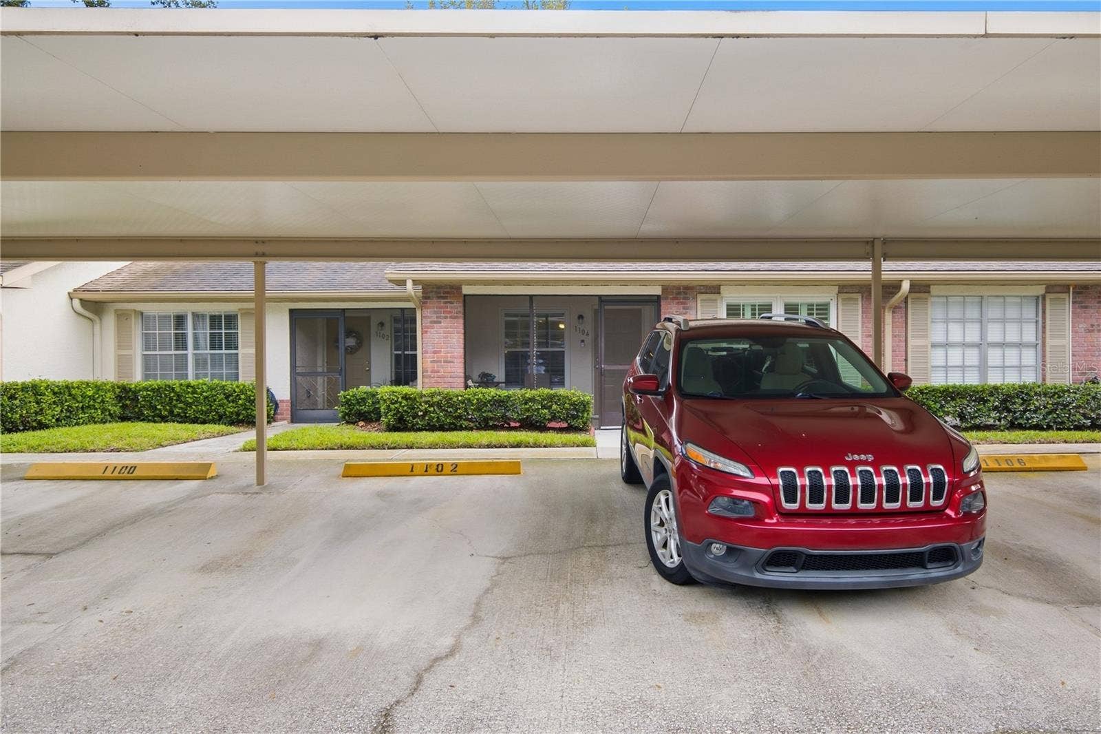 1104 TARRIDON COURT, Dunedin, FL 34698 1 Space Carport Included