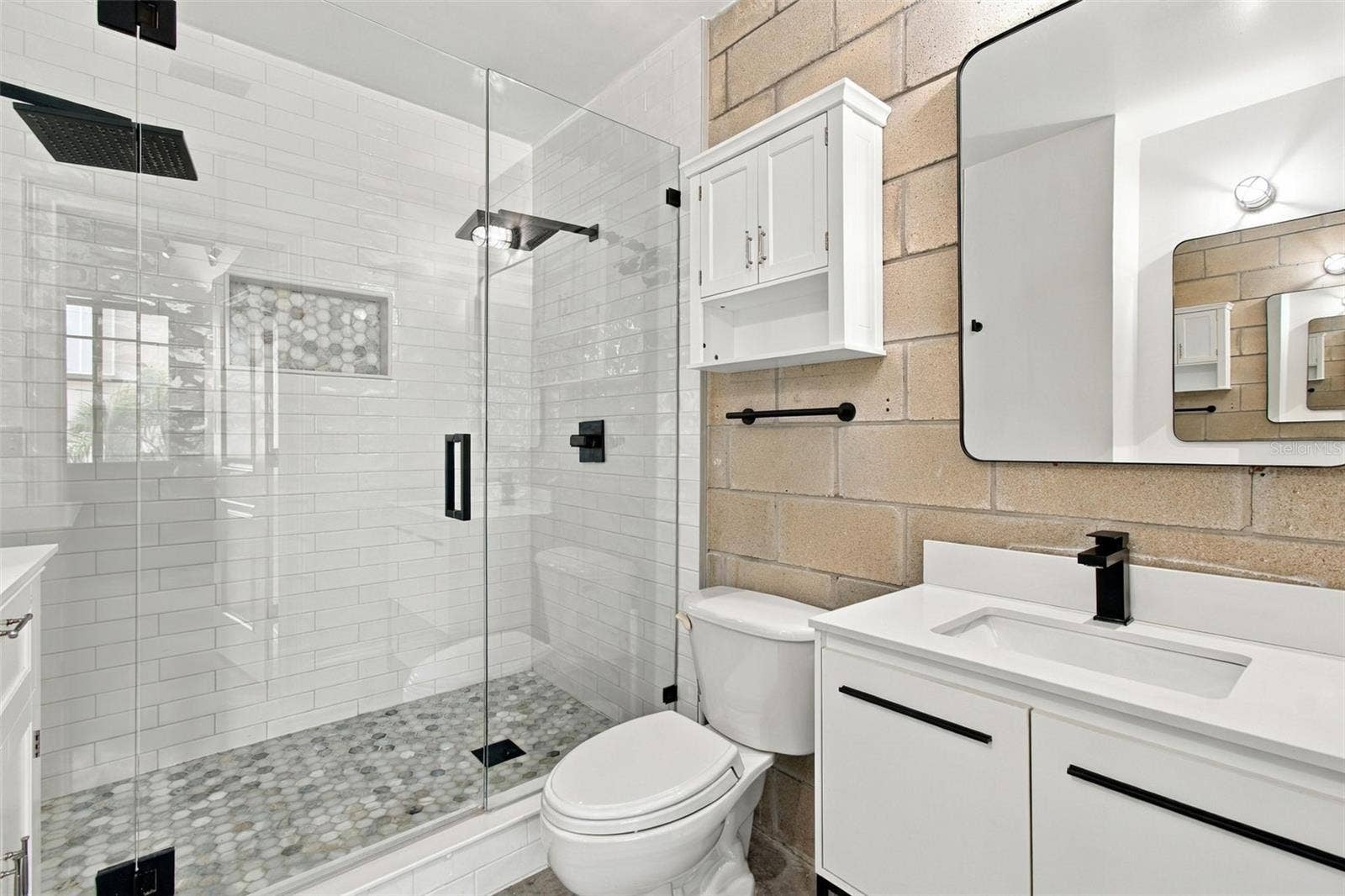 2509 W AZEELE STREET, Tampa, FL 33609 Beautifully updated modern bathroom with premium finishes.
