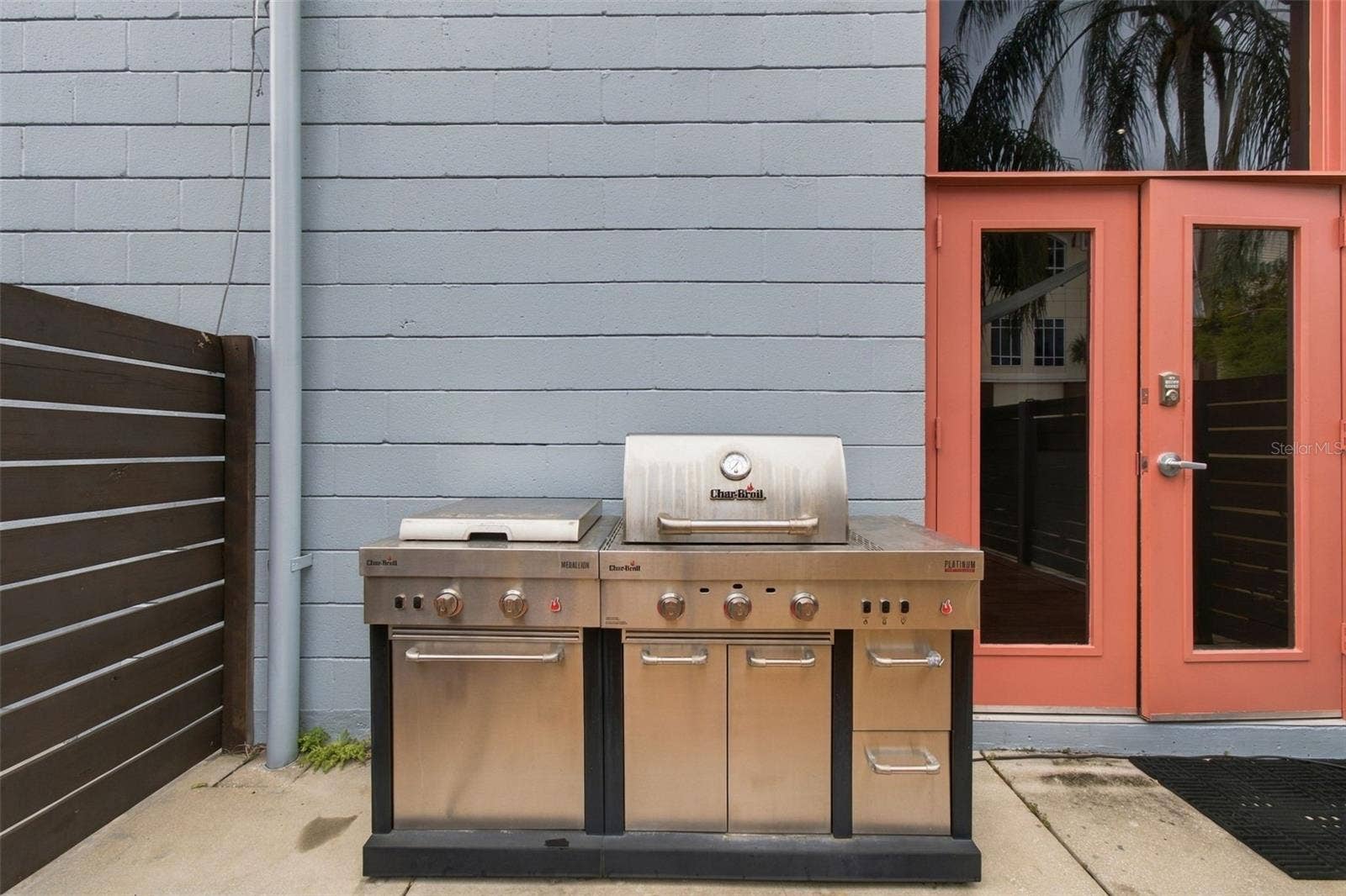 2509 W AZEELE STREET, Tampa, FL 33609 Outdoor grill remains on property, perfect for grilling and entertaining.