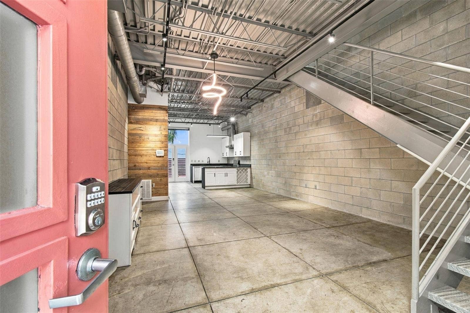 2509 W AZEELE STREET, Tampa, FL 33609 Industrial-chic open concept floor plan blending modern upgrades with raw architectural elements.