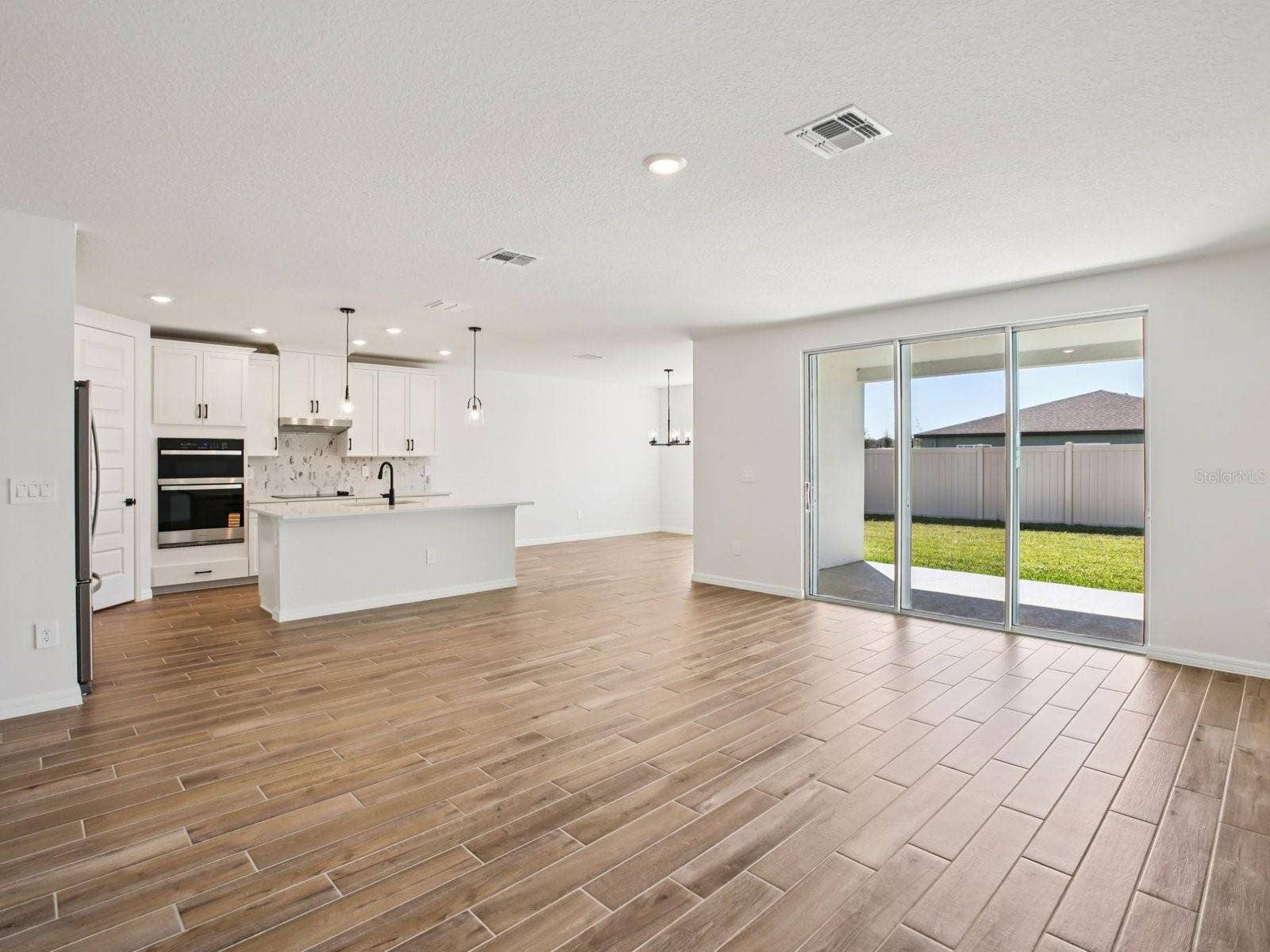 43 GARNI DRIVE, Palm Coast, FL 32137 Photo is not of the actual home, but is an inspirational photo of builders model home and may depict options, furnishings, and/or decorator features that are not included.