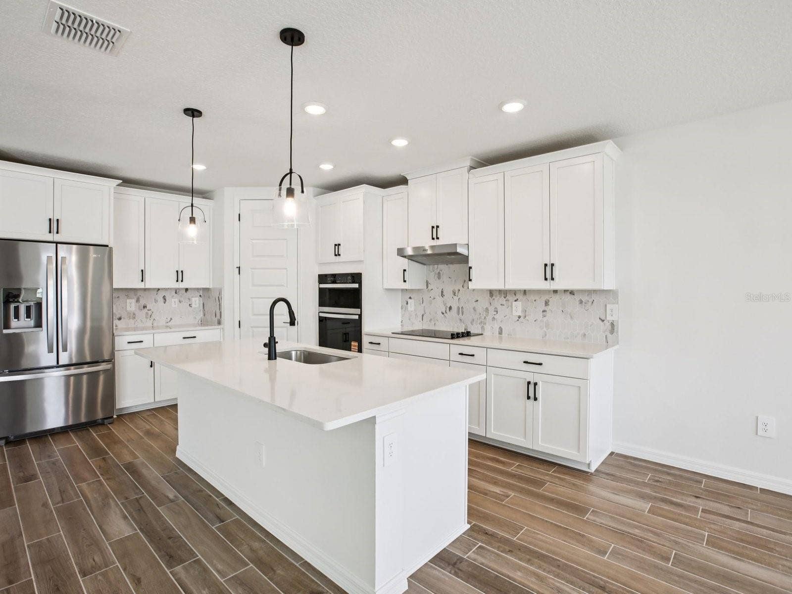 43 GARNI DRIVE, Palm Coast, FL 32137 Photo is not of the actual home, but is an inspirational photo of builders model home and may depict options, furnishings, and/or decorator features that are not included.