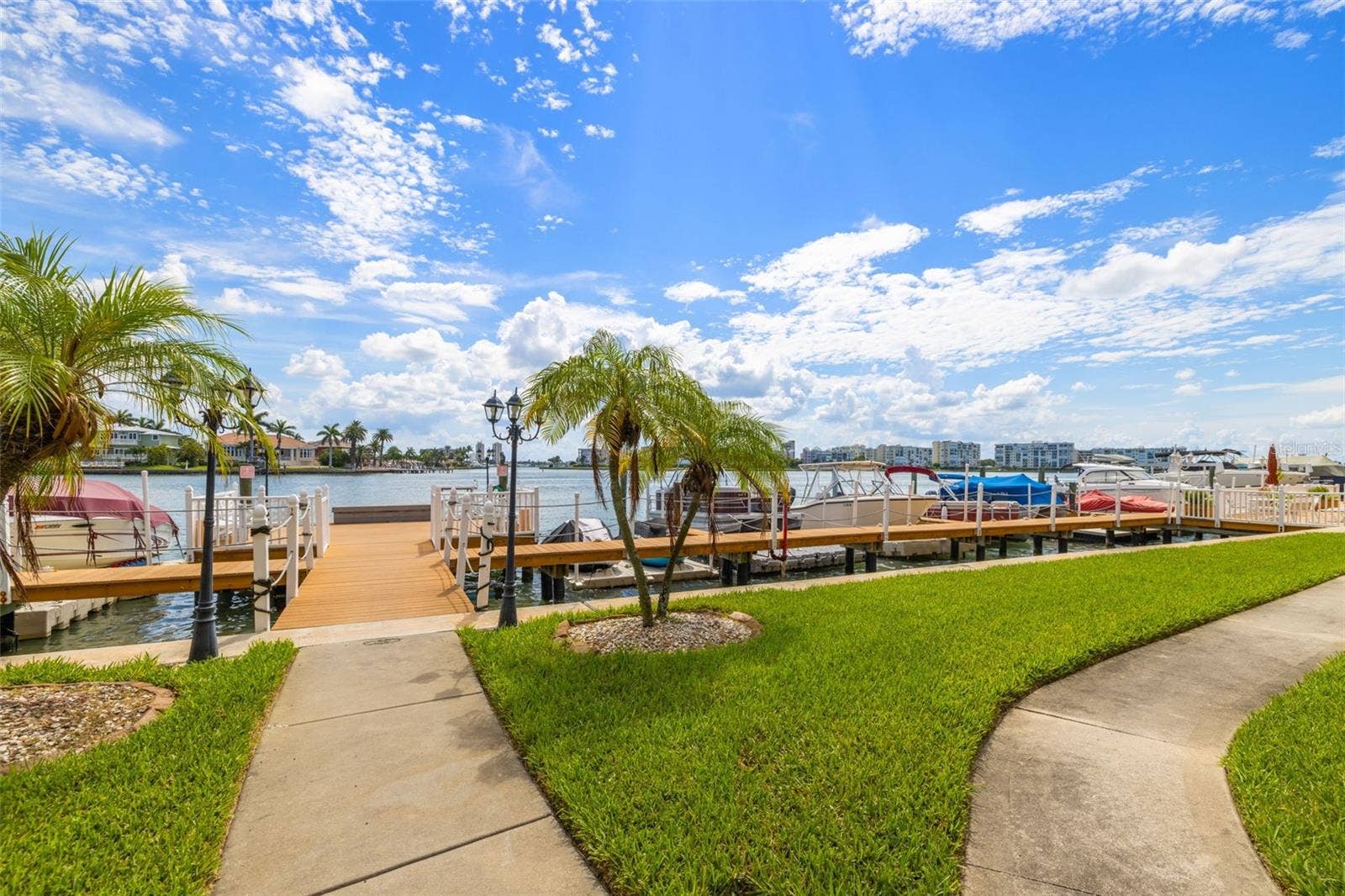 8921 BLIND PASS ROAD, #250, St Pete Beach, FL 33706 pathway to deck and pool